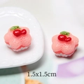 Detailed macro view of 1.5x1.5cm miniature resin strawberry cherry cake for DIY crafts - Flower Cake - Pink