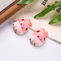Close-up of cute pink resin clownfish charms with bubble texture and 3D big eyes - Sold by Piece / Pink