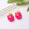 Detailed view of pink resin strawberry charms with white polka dots for DIY hair clips - Rose Red Single Sale