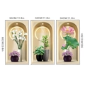 Set van 3 3D-nis muurstickers met lelies in potten en groene decoratieve kamerplanten - 30x60cm Set van 3
