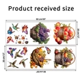 Dettaglio di due fogli di adesivi murali con cesti di frutta e motivi di colibrì vivaci - 30x90cm (Set da 2)