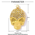Detailed macro view of a gold skull pendant featuring inlaid rhinestones and stainless steel - Rhinestone Skull (XF887)