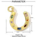 Macro detail of golden horseshoe pendant featuring dimensions and colorful zircon stones - Horseshoe Style (YE933)