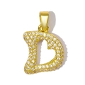 Macro shot of gold D-letter pendant with micro-pave zirconia crystals on a white background - Letter D (YE1358-D)