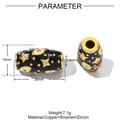 Macro detail of copper evil eye charms with black enamel finish and gold star pattern - Black Enamel Style (YE1399)