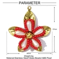 Detailed view of flower pendant with white pearls and red glass beads measuring 37mm by 34mm - Red Gold Pearl Flower Pendant (YF435-3)