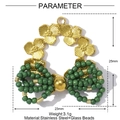 Detail of crystal flower bow pendant made of stainless steel with 23x25mm dimensions - Flower Bow Style - Green