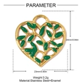 Macro view of gold heart pendant with green enamel leaf inlay and stainless steel frame - Hollow Heart Leaf Style(YH1550)