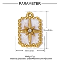 Detail view of a 11x16mm gold stainless steel charm with white enamel and star crystal - White Enamel Starburst Rectangle (YH1667-1)