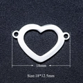 Detailed view of 18mm heart-shaped stainless steel connector with brushed metal texture - Silver Heart (JA365-1)