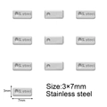 Close-up of 3x7mm silver stainless steel rectangle tags with S. Steel engraved detail - 3x7 Rectangle