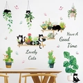 3D realistic wall stickers featuring cute cats and green plants on a white wall decor - Potted Black Cat (HT94022)