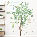 Dettaglio dell'adesivo murale albero verde con uccelli acquerello e gabbie dorate - Albero Verde Gabbia per Uccelli