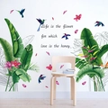Dettaglio di adesivi murali con piante tropicali, colibrì e citazione d'ispirazione - Adesivo Murale Foglie Verdi (HT98001AB)