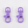 Two bright purple plastic lobster claw clasps with rotating D-rings for DIY crafts - Purple