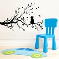 Black silhouette wall decal featuring a cat on a tree branch with flying birds for home decor - Black Tree Branch Cat Silhouette (8515)