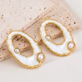 Franse vintage gouden ovalen hangers met witte textuur en parels op natuursteen - Holle Bubbel / Goud / 47x30mm