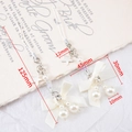 Star pearl bow charm keychain with white ribbon and silver star pendant for cameras - White