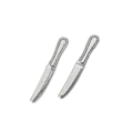 Close-up of vintage silver miniature knife charms with embossed dot patterns on handles - Antique Silver Knife
