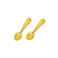 Macro shot of two golden miniature cutlery spoons with decorative beaded texture handles - Gold Spoon