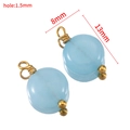 Pendente in pietra naturale blu chiaro traslucido con filo d'oro e diametro di 8mm - Confezione da 10 / Azzurro