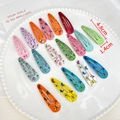 17-piece colorful metal BB clips set with cute animal and floral patterns in a dish - Mixed Animal Patterns