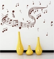Vinilos decorativos de notas musicales marrones sobre jarrones amarillos en un salón - 100x60cm / Marrón