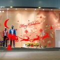 Red Christmas window sticker featuring Santa Claus on a reindeer sleigh with snowflakes - 58x17CM / Red