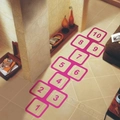 Colorful hopscotch floor decals for kids bedroom featuring numbered 1 to 10 pink squares - Hollow Engraved Pink