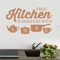 Kitchen wall decal featuring 'Seasoned with Love' text and cookware silhouettes for decor - 52*30CM / Brown