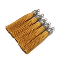 Five golden yellow tassels with antique silver caps and engraved patterns for DIY jewelry - Dark Yellow