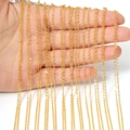 Detail of multiple shiny gold-plated link chains for DIY jewelry making with lobster clasps - 40cm (12 Pieces/Pack) / Gold Minimalist