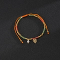 Bohemian adjustable orange cord bracelet with glass beads, pearl and monstera leaf pendant - Leaf