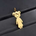 Macro shot of a hollow gold cartoon girl pendant made of polished stainless steel - Girl Pendant (Gold)