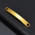 Macro shot of a polished gold-plated curved bar charm for NK chain bracelets on black leather - Gold Curved Plate