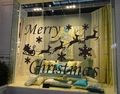Christmas window wall decals with Merry Christmas text, flying reindeer, and snowflakes - Black / 58*34CM