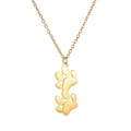 Macro view of gold stainless steel necklace featuring a dual pet paw print pendant design - Double Paws