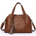 Brown faux leather tote bag with V-shaped stitching and woven handles for women - Brown