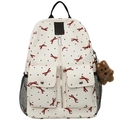 Sac à dos matelassé beige avec nœuds rouges et pois noirs pour un look chic quotidien - Blanc