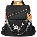 Zaino nero in nylon Oxford con ricami floreali e dettagli di nappe in pelle marrone - Nero