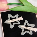 Matte pale green star hair clips in a 2-piece set with a minimalist duckbill design - Off White