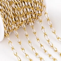 Golden 304 stainless steel oval chain with white enamel details on plastic spool - White