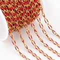 Golden stainless steel oval link chain with red enamel detail on white spool - Red