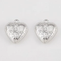 Silver heart pendant with floral relief and top hole for DIY jewelry making - Floral Engraving