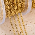 Detailed close-up of gold 304 stainless steel O-link chain for DIY jewelry making. - 1m / Heavy Cross Chain-0.3mm