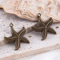 Pendentifs étoile de mer en bronze antique pour création de bijoux océan - Étoile de Mer-Bronze / 22x25.5