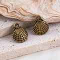 Breloques coquilles de pétoncle en bronze antique pour bijoux DIY sur fond de pierre - Coquille-Bronze / 10x13