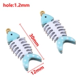 Sky blue and white enamel fishbone charms with white dots and golden metal finish - 12x30mm / Light Blue