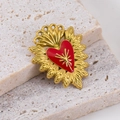 Golden Sacred Heart pendant with red enamel inlay on decorative stone display - Heart Red (21x25mm)