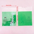 Green giraffe cartoon self-adhesive cookie bag with size 10x10cm plus 3cm seal - 50 Pieces/Pack (10x10cm) / Green Fawn